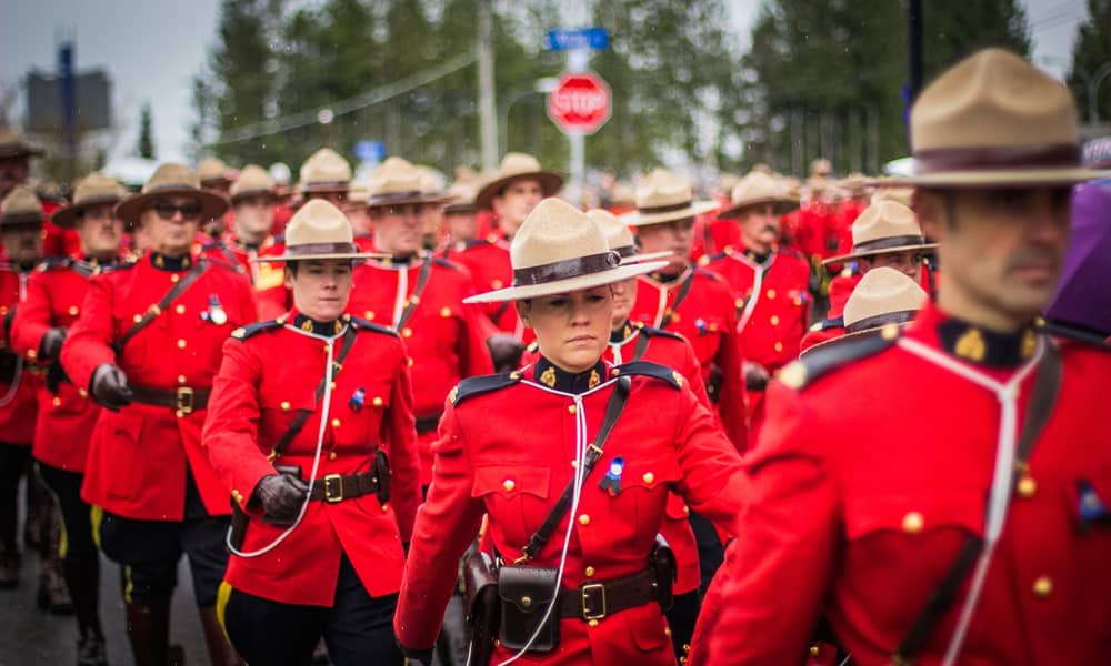 RCMP marching in dress reds