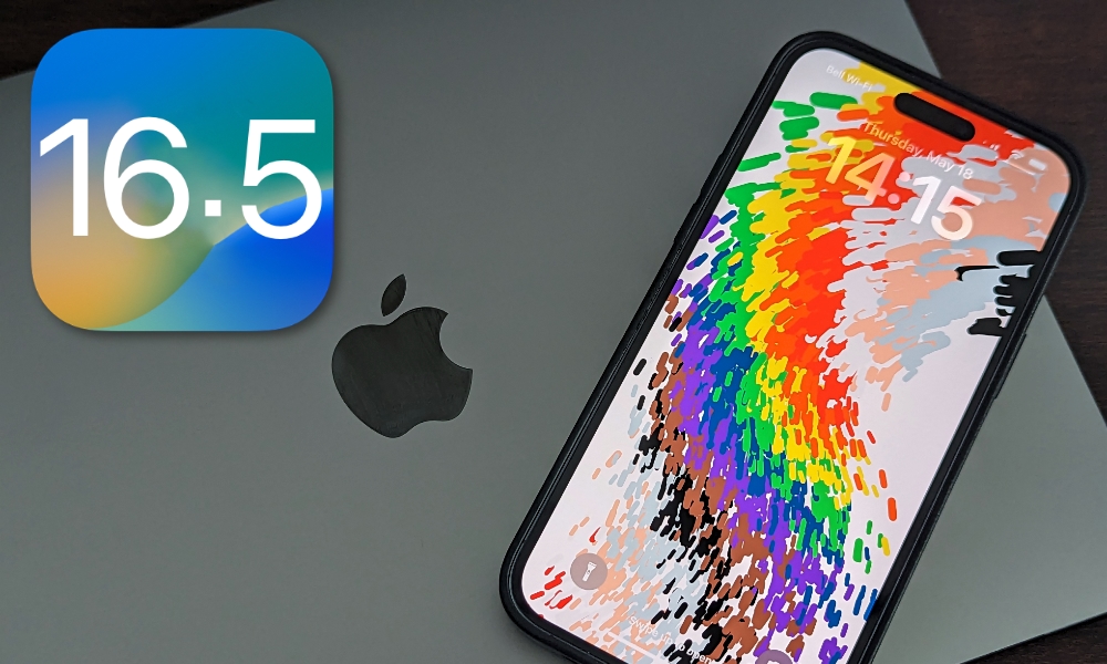 iOS 16.5 iPhone 14 Pro max with pride wallpaper on MacBook Pro