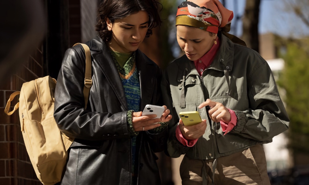 WWDC2023 two women looking at iPhones