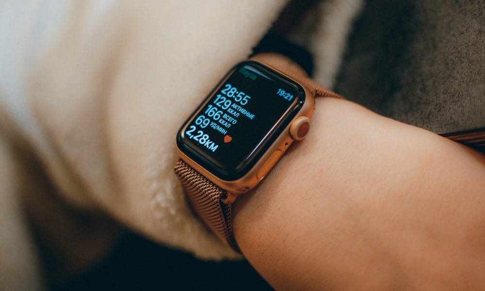Apple Watch on wrist with workout running