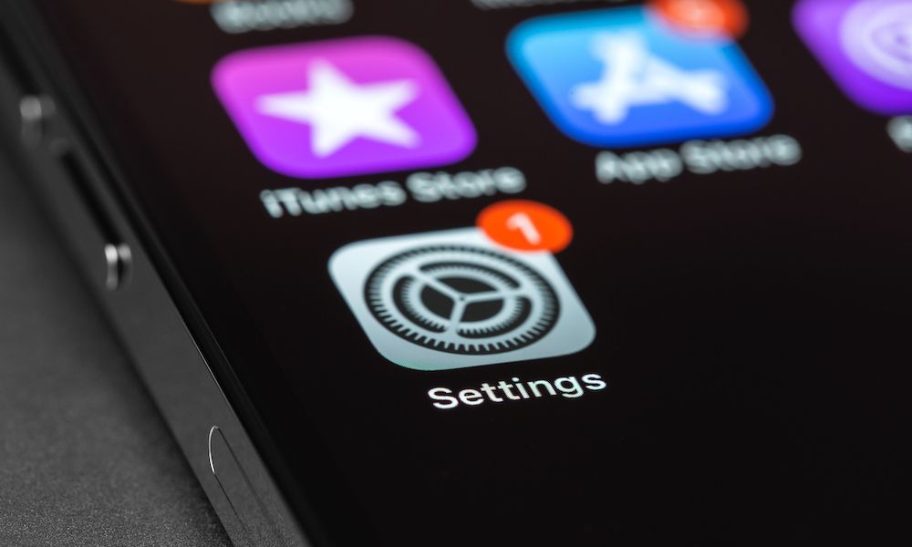 iPhone with Settings, iOS update on screen, interface icons closeup. Apple is a multinational technology company. Moscow, Russia September 5, 2021 iPhone with Settings, iOS update on screen, interface icons closeup. Apple is a multinational technology company. Moscow, Russia September 5, 2021