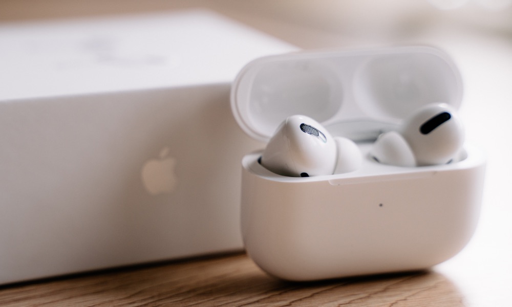 AirPods Pro in case beside box
