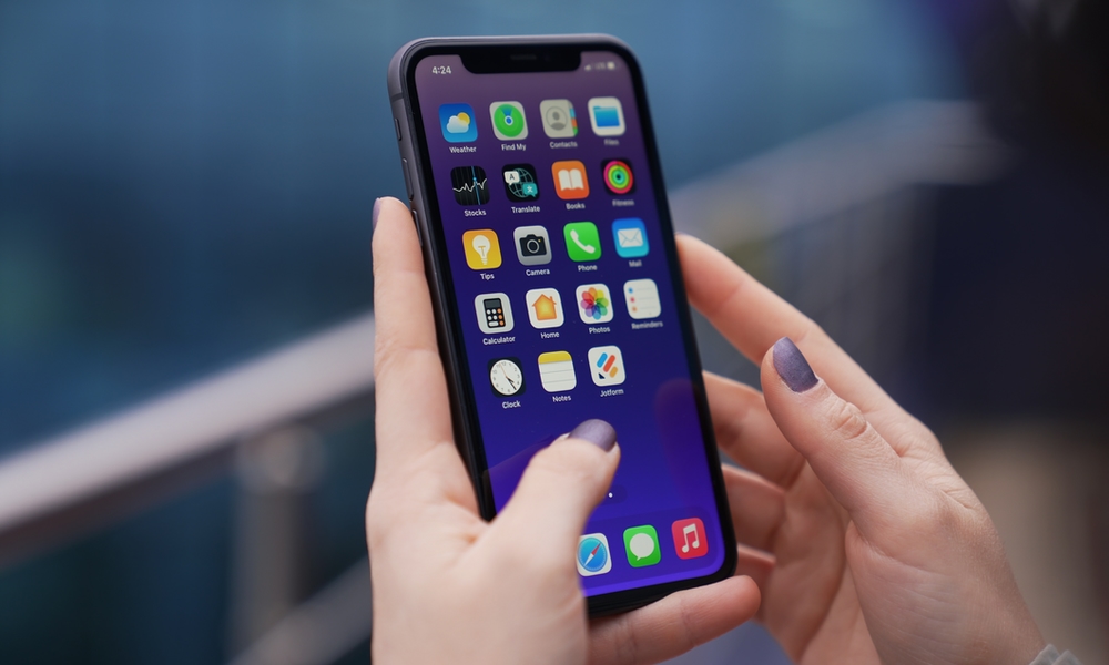 Person using iPhone Person using iPhone