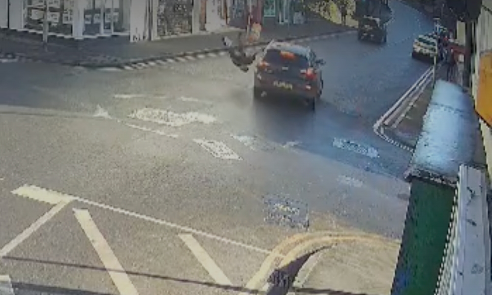 UK CCTV clip pedestrian hit by car