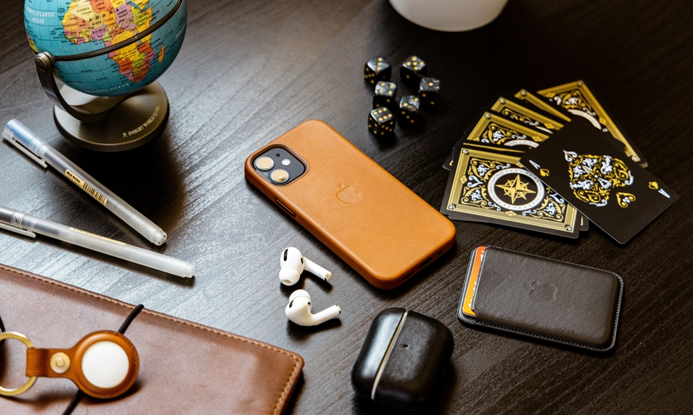 iPhone accessories leather on wooden desk