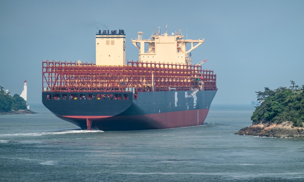 A newly built empty container freight ship
