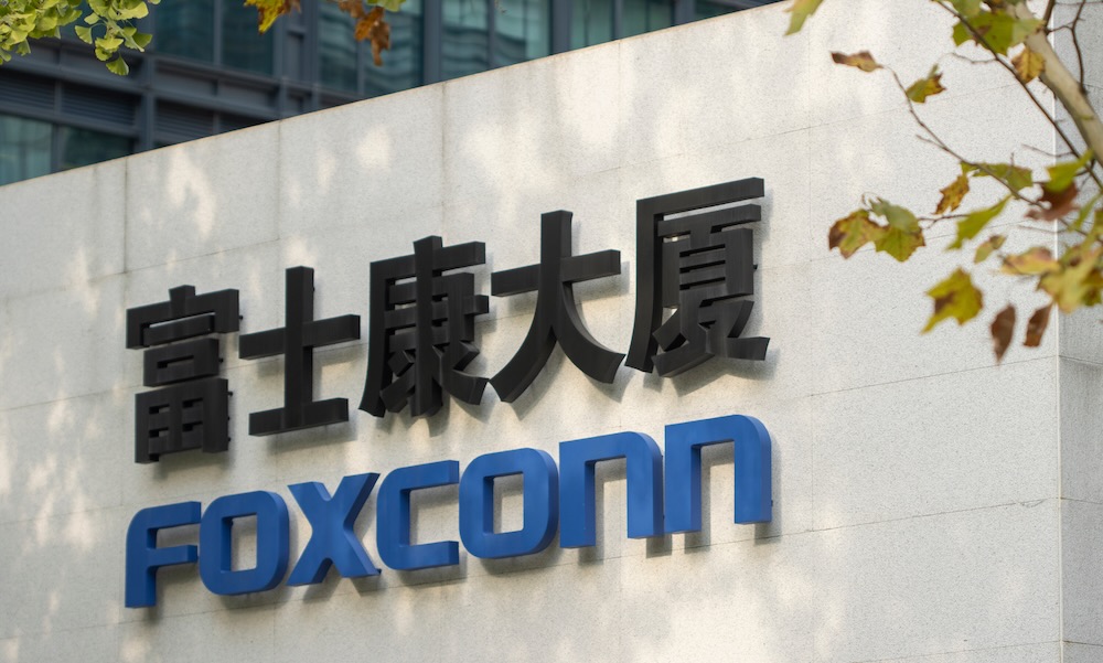 Shanghai, China Oct 23, 2023: Foxconn sign is seen outside its Shanghai headquarters building in China. Taiwanese electronics contract manufacturer Foxconn is one of Apple's largest suppliers.