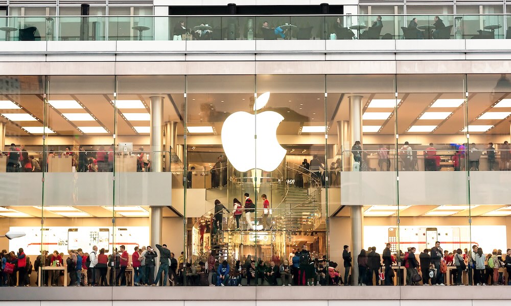 People shopping in Apple megastore during Christmas holidays in Hong Kong 24 december 2013