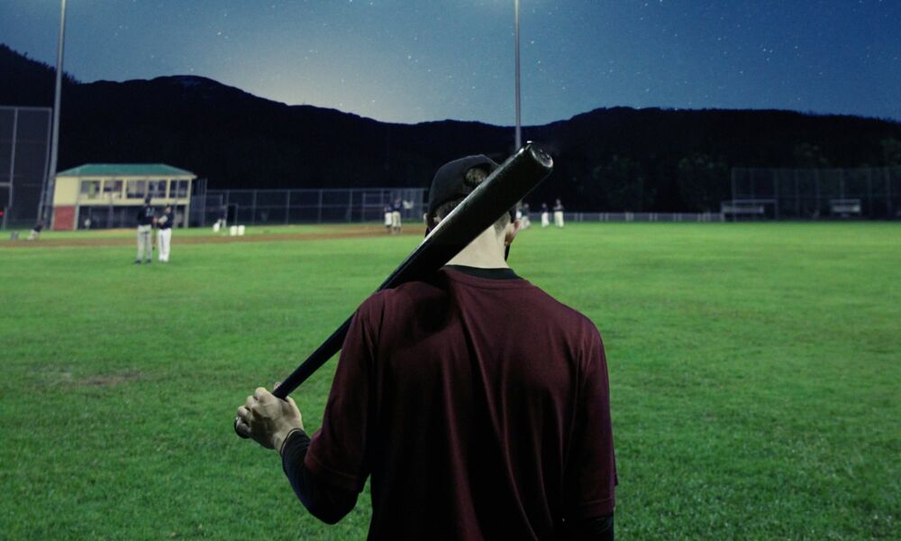 baseball batter leaving the field