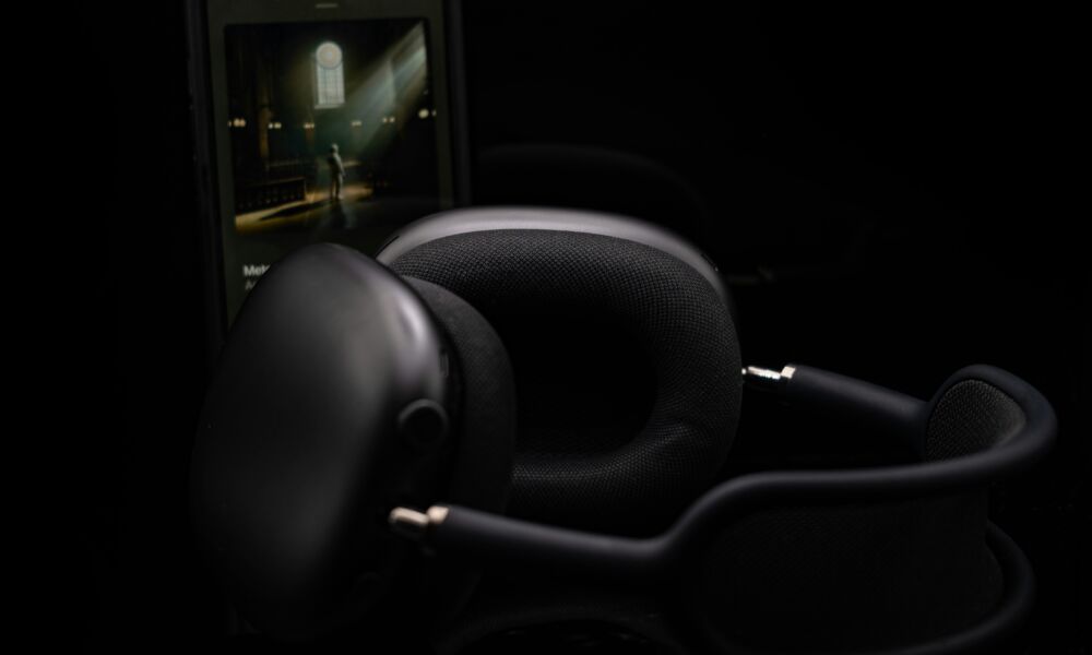 black AirPods Max in shadows