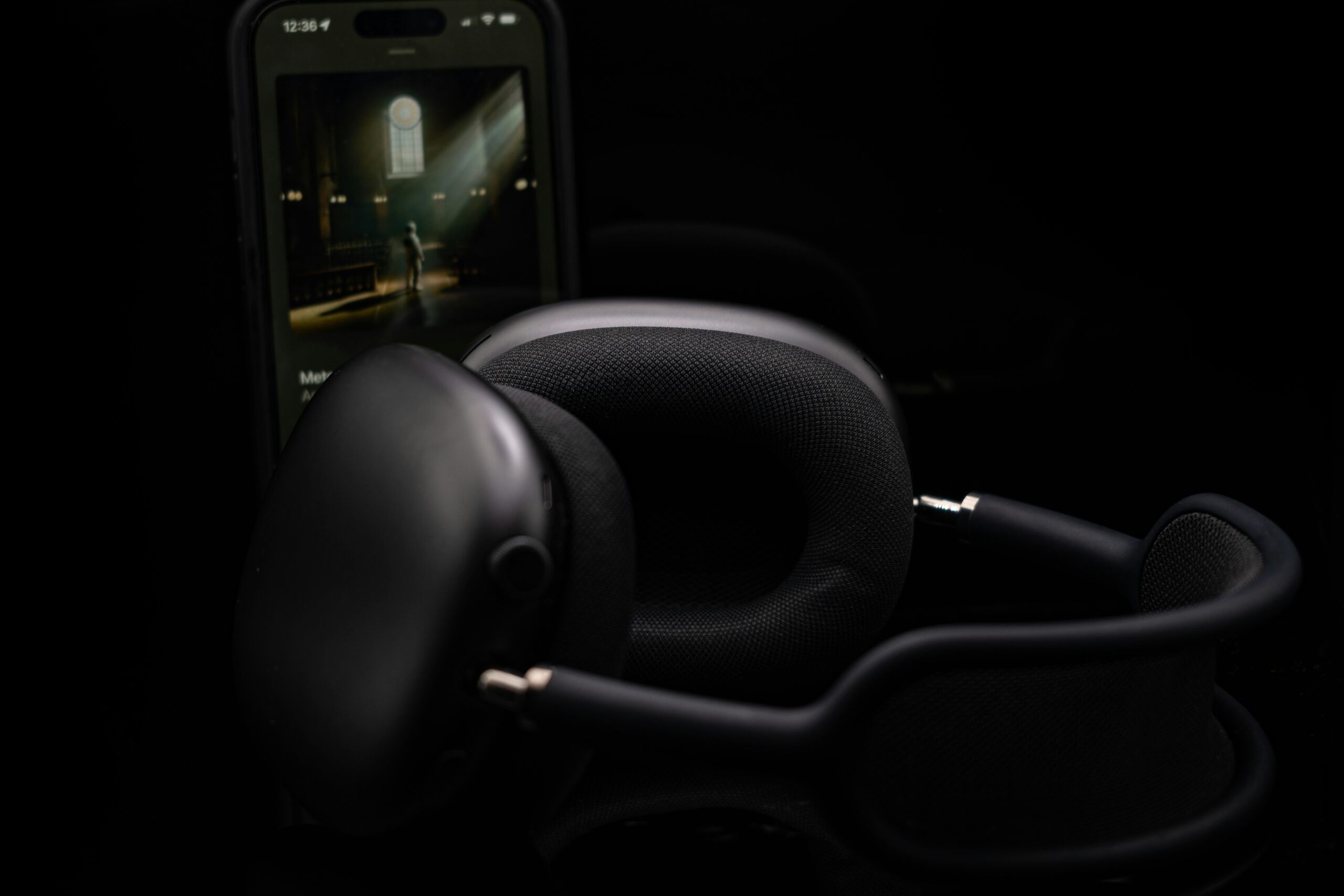 black AirPods Max in shadows
