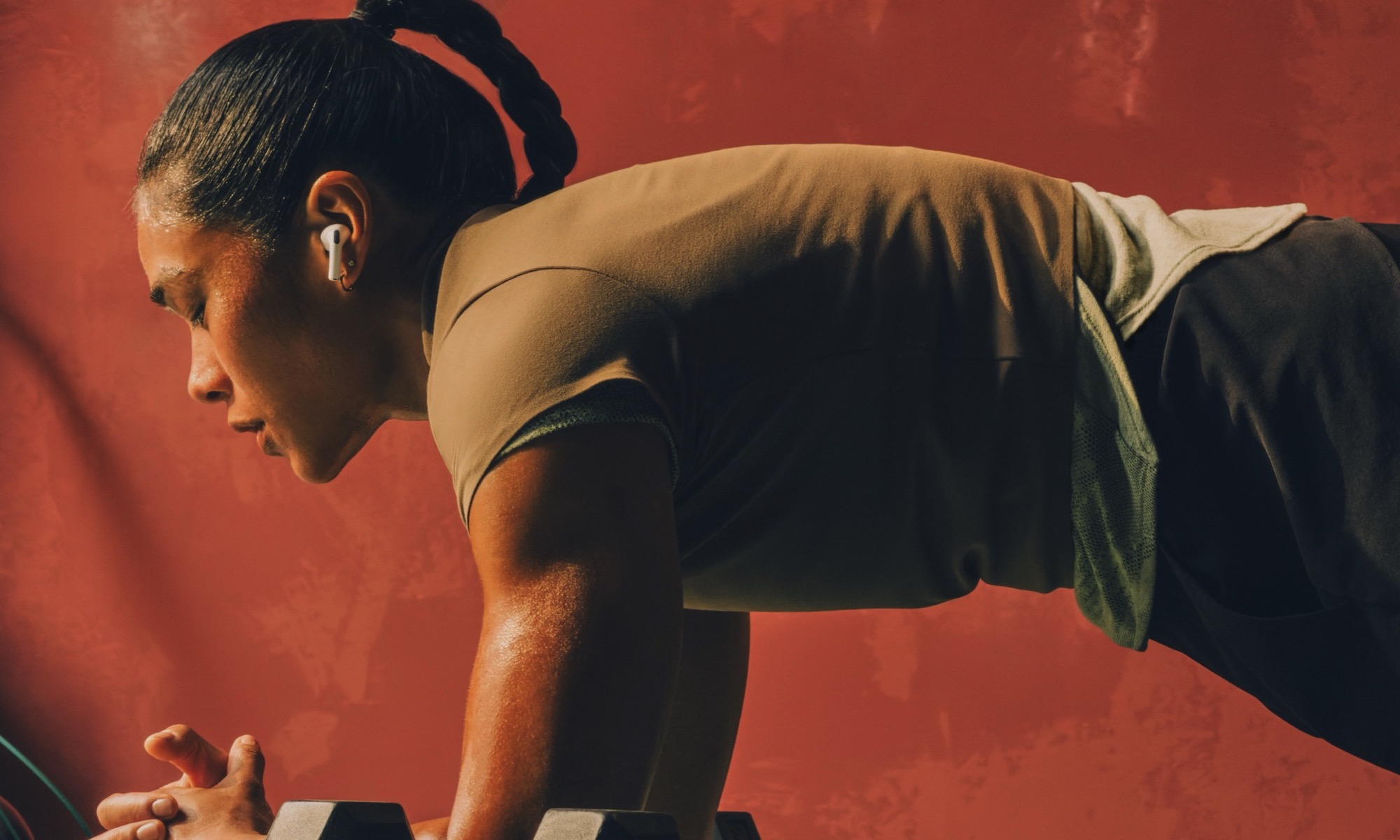person working out with AirPods Pro 3