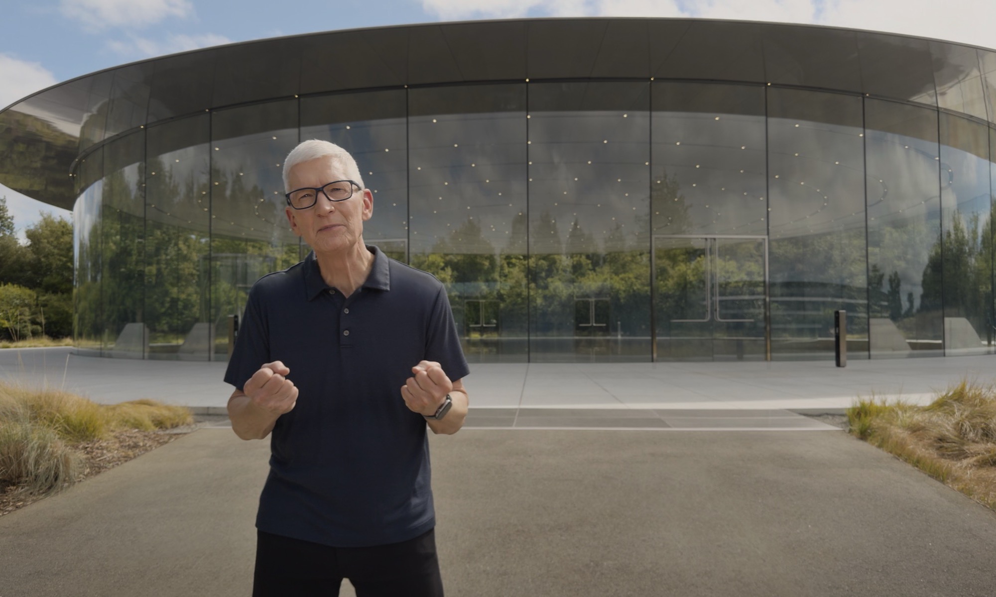 Apple CEO Tim Cook standing outside Apple Park.