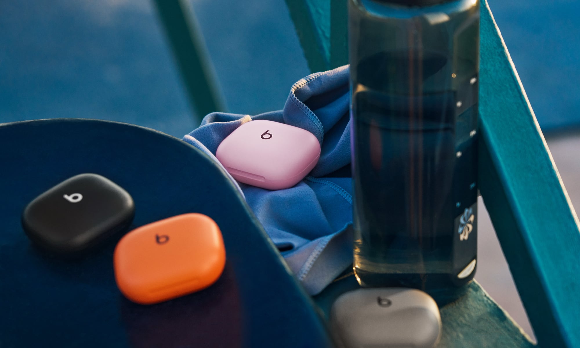 Powerbeats Fit family in cases in all colors