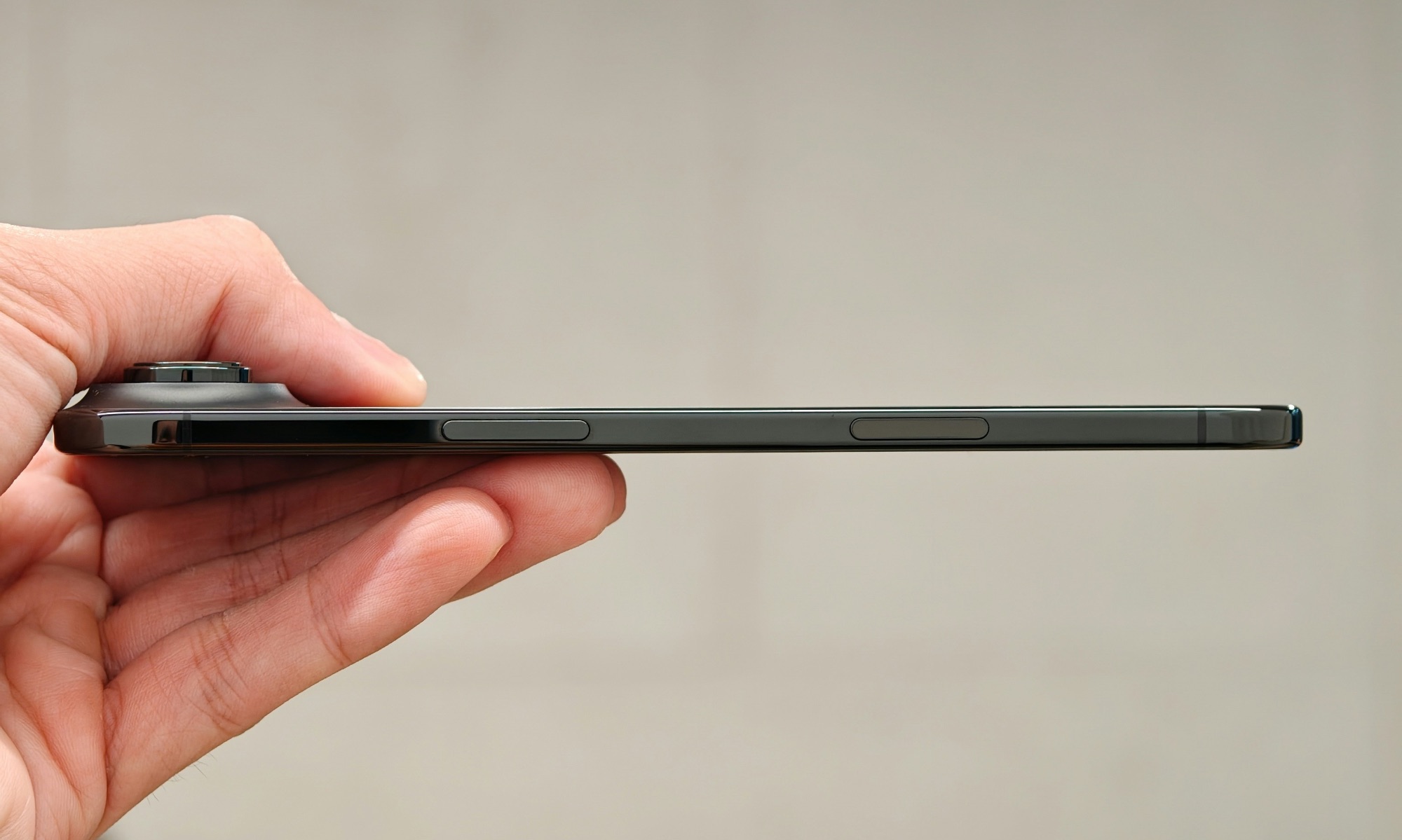 iPhone Air in hand side edge view