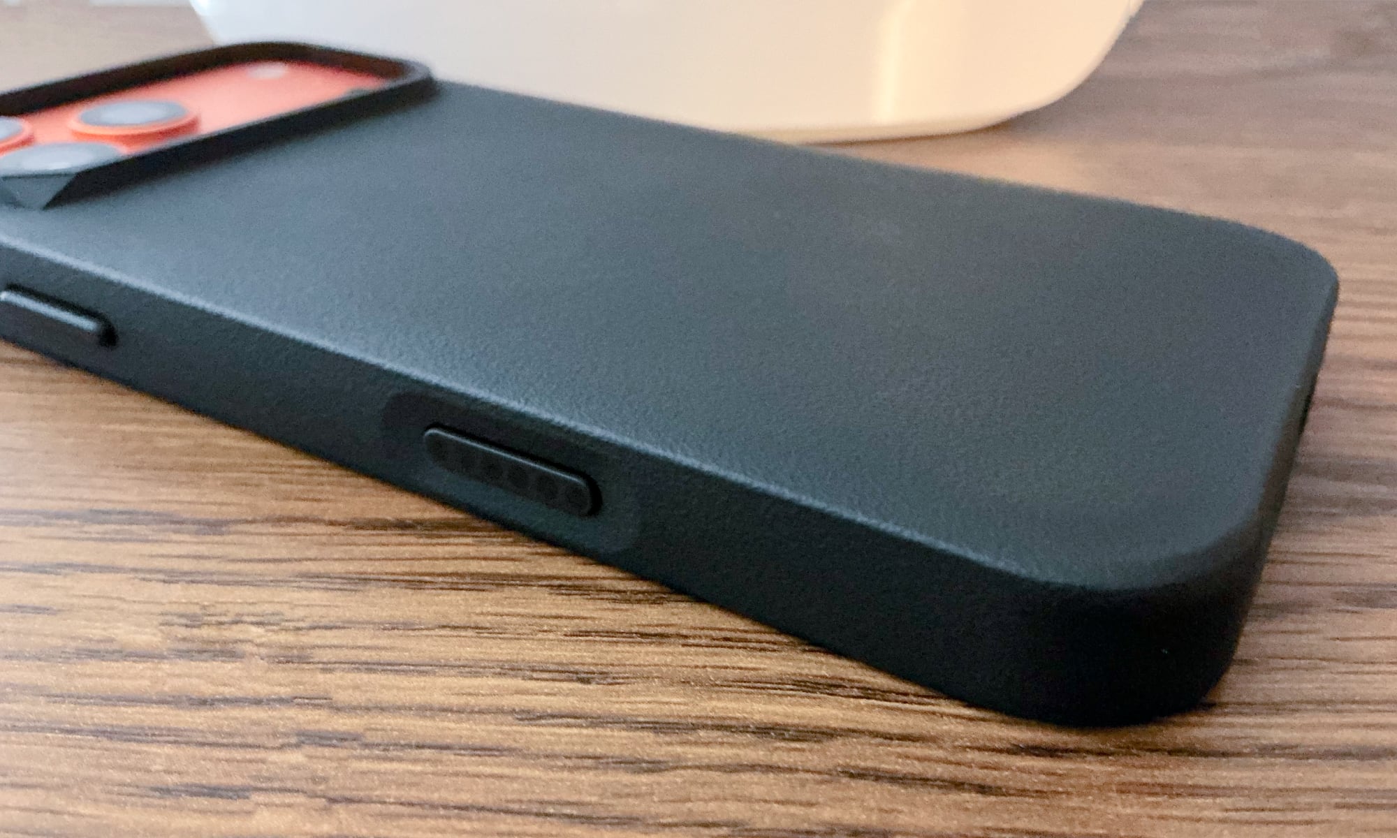 Detail shot of Rhinoshield SolidX Camera Control button coverage.