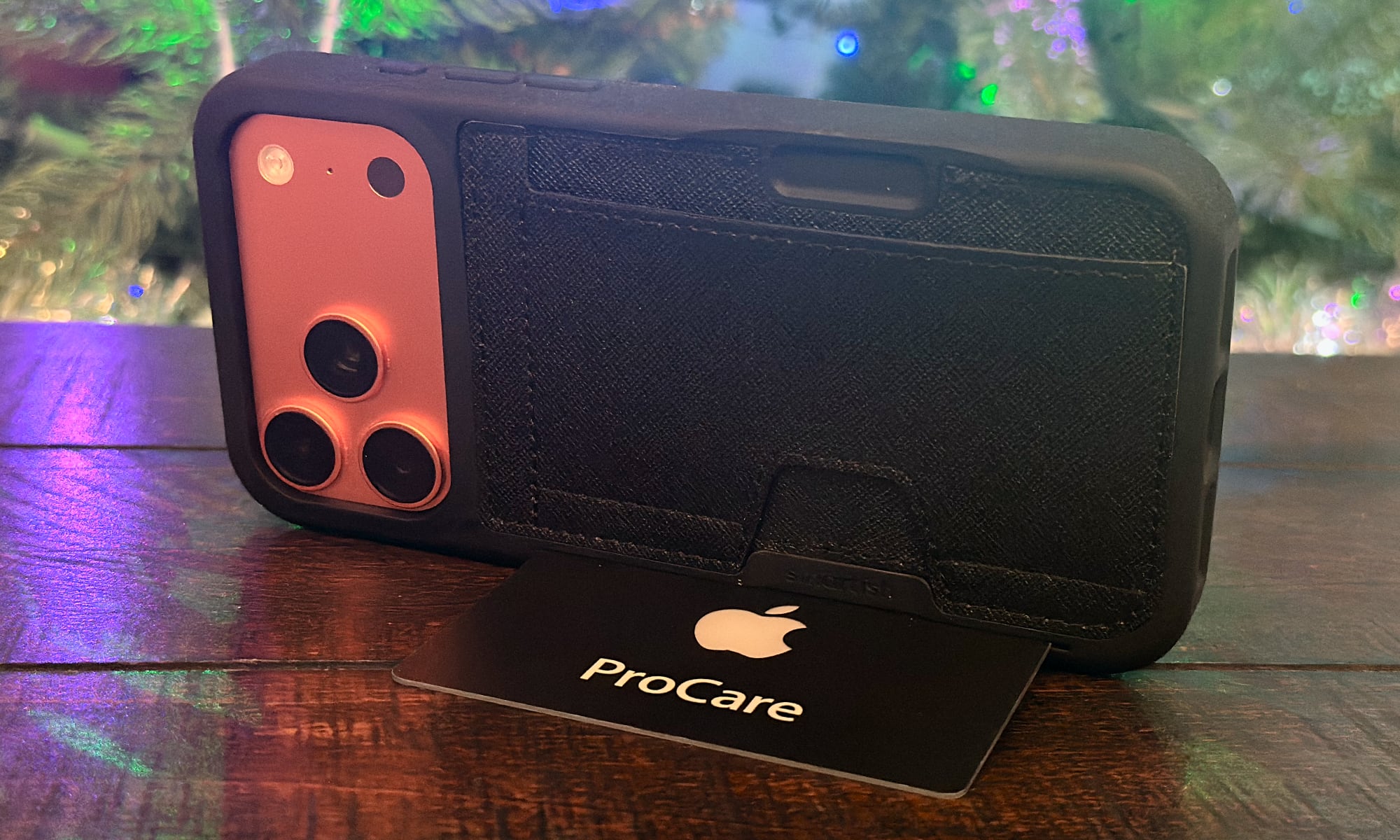 Smartish Wallet Slayer Vol. 2 iPhone 17 Pro Max case propped up using its plastic card stand feature.