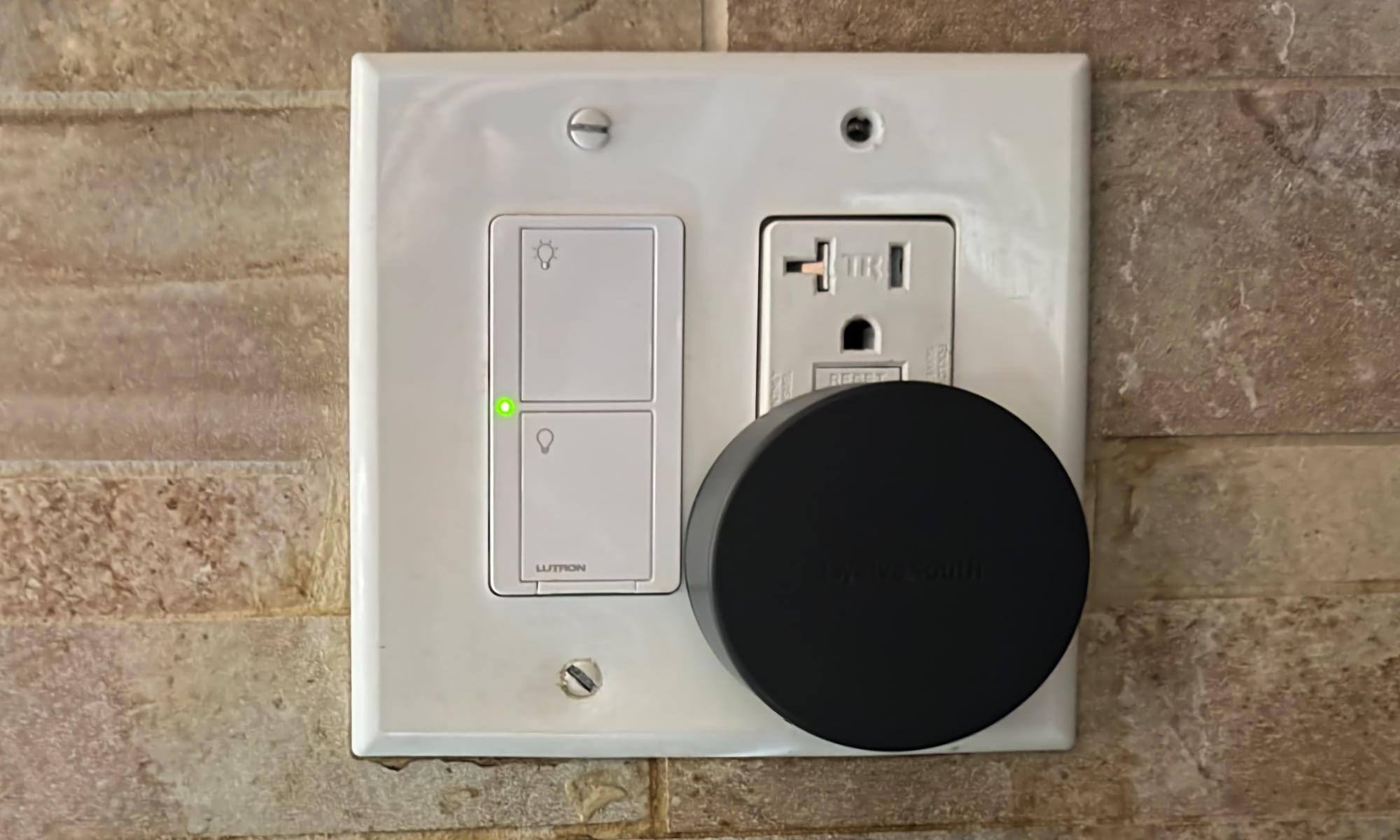 TwelveSouth PowerBug Charger plugged into a kitchen wall outlet.