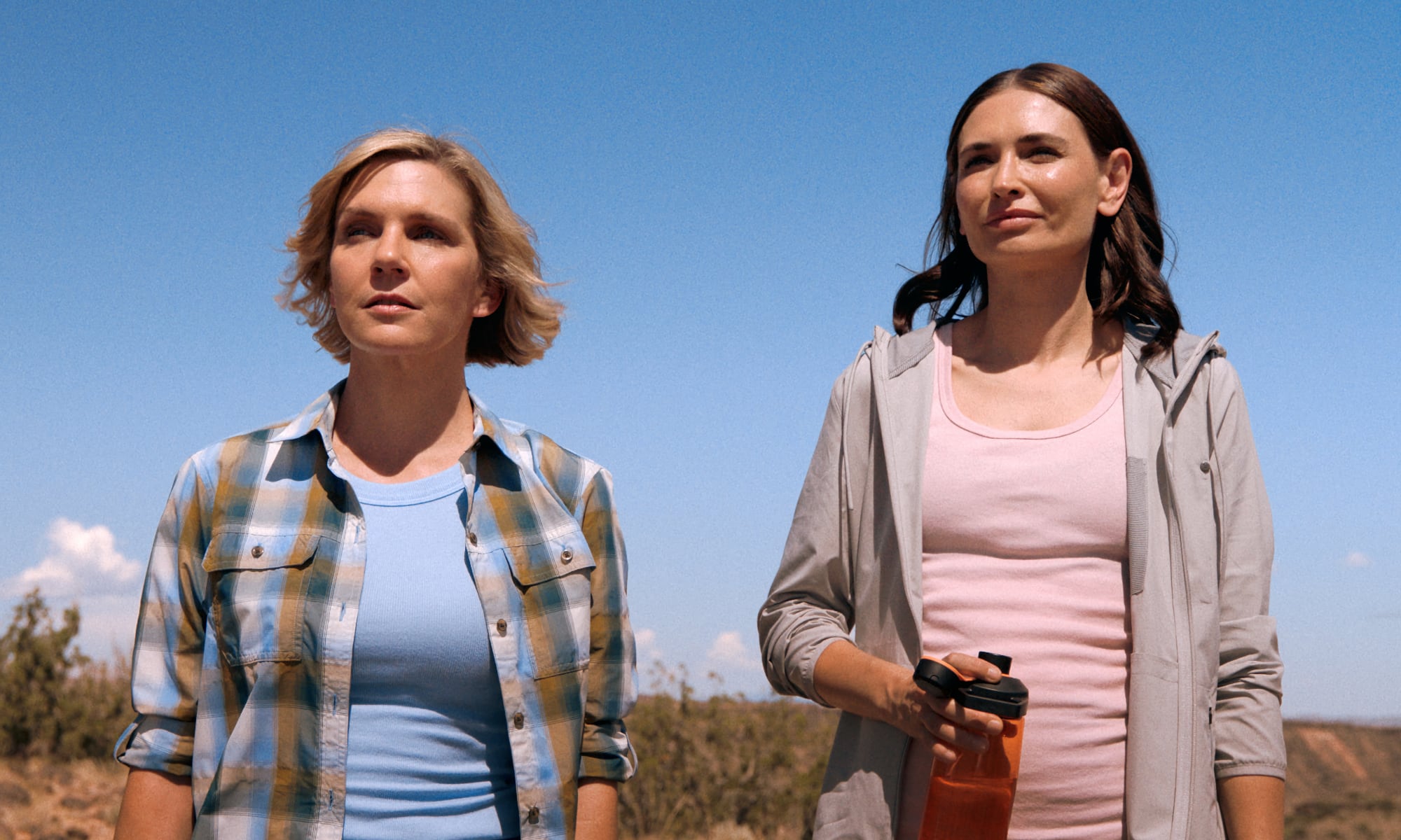 Rhea Seehorn and Karolina Wydra in "Pluribus," now streaming on Apple TV.