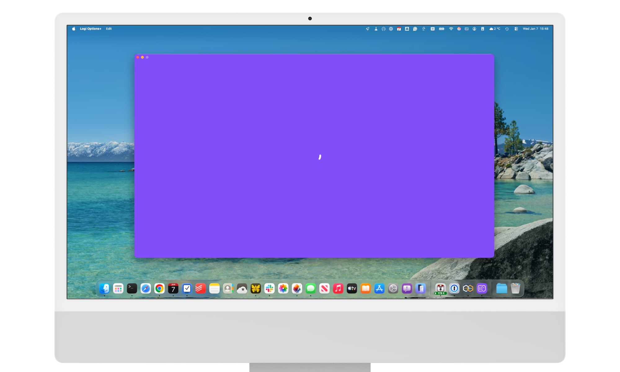 A 24-inch iMac showing the Logi Options+ app failing to load.