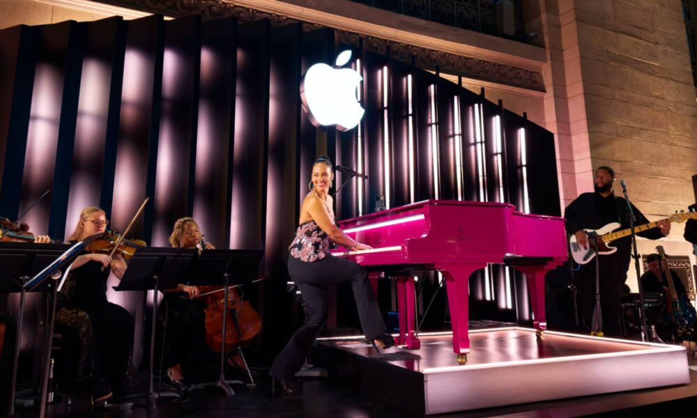 Alicia Keys performing on her signature pink piano at Apple Store Grand Central Terminal.