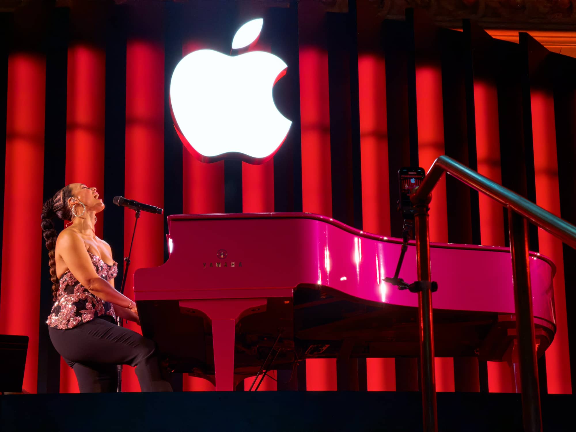 Alicia Keys performing on her signature pink piano at Apple Store Grand Central Terminal.
