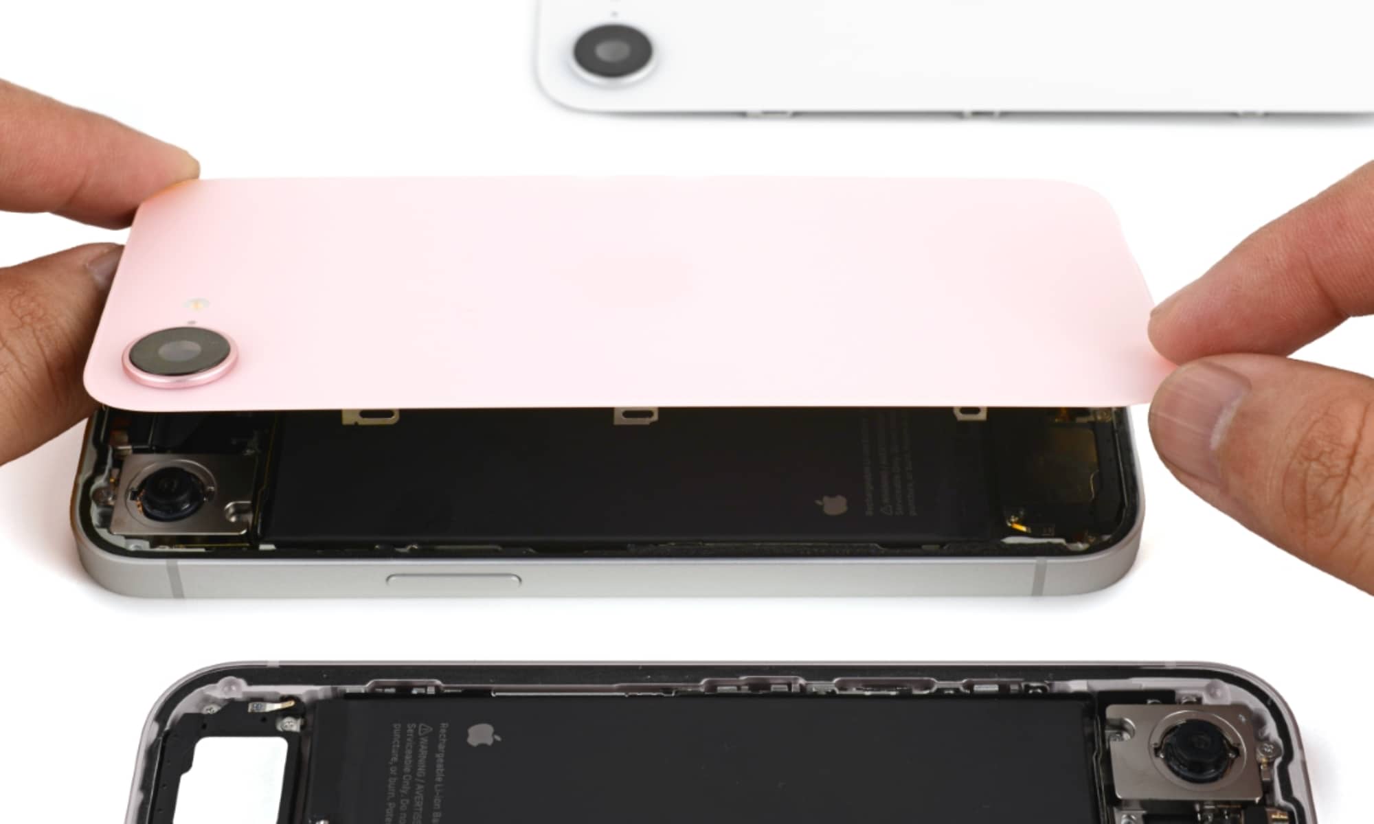 Swapping the glass back between an iPhone 16e and iPhone 17e.