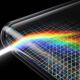 A conceptual close-up conceptual abstract image showing light refracting and dispersing into a rainbow spectrum as it enters the complex quad-curved glass corner of a futuristic display, visualizing potential edge distortion.