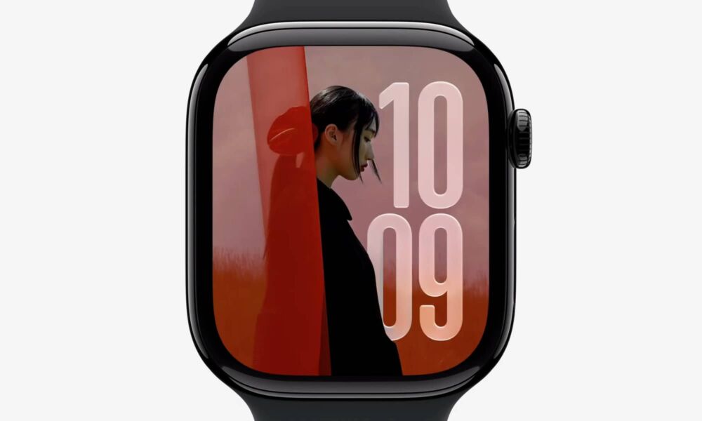 Apple Watch showing watchOS 27 face.