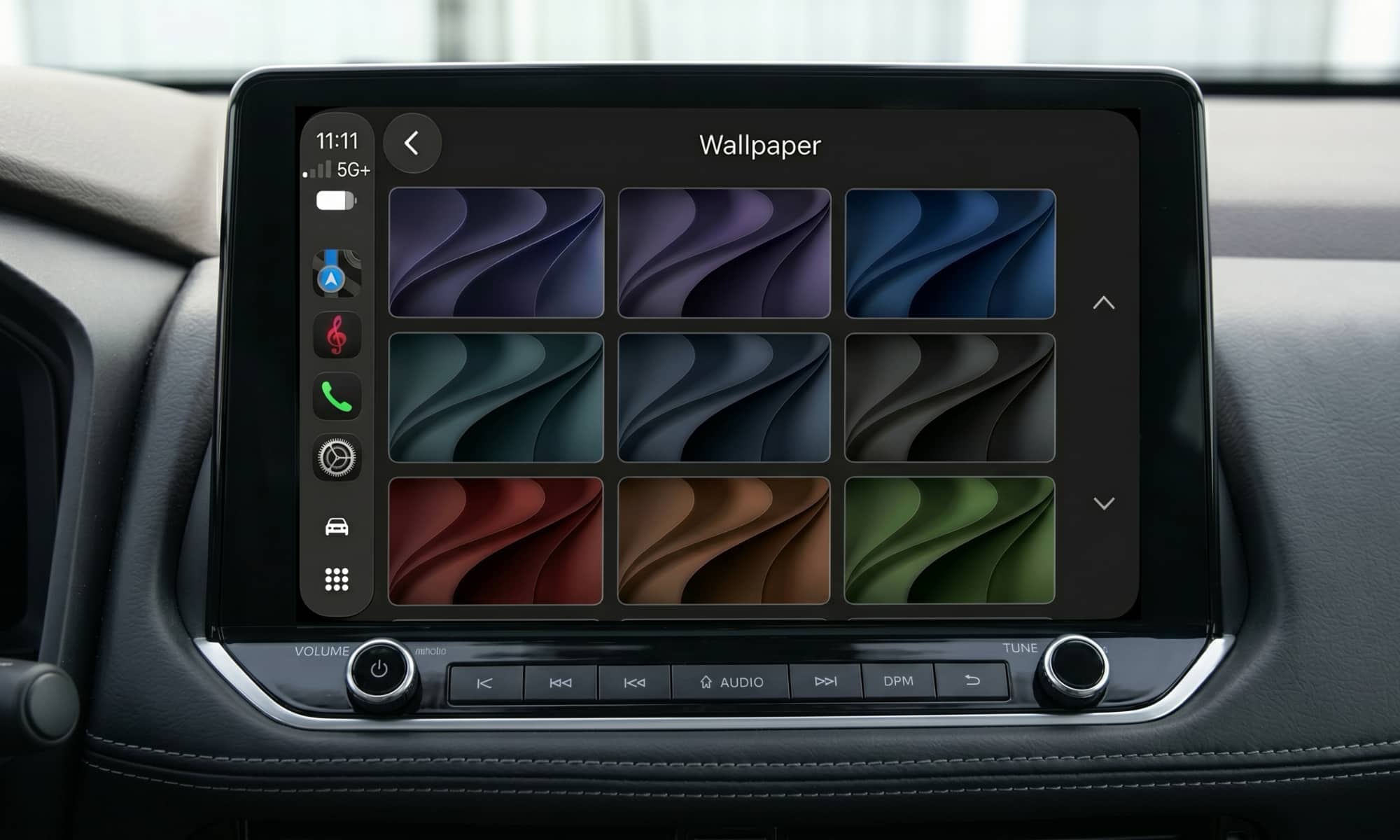 Vehicle infotainment display showing CarPlay Wallpapers in iOS 27.
