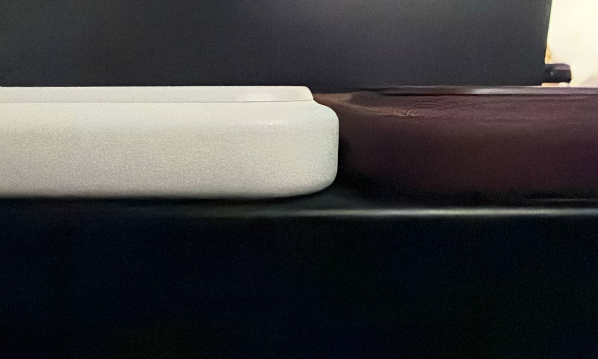 Edge comparison of camera plateau lip between Moft Movas case for iPhone 17 Pro Max (left) and Apple TechWoven for iPhone 18 Pro Max.