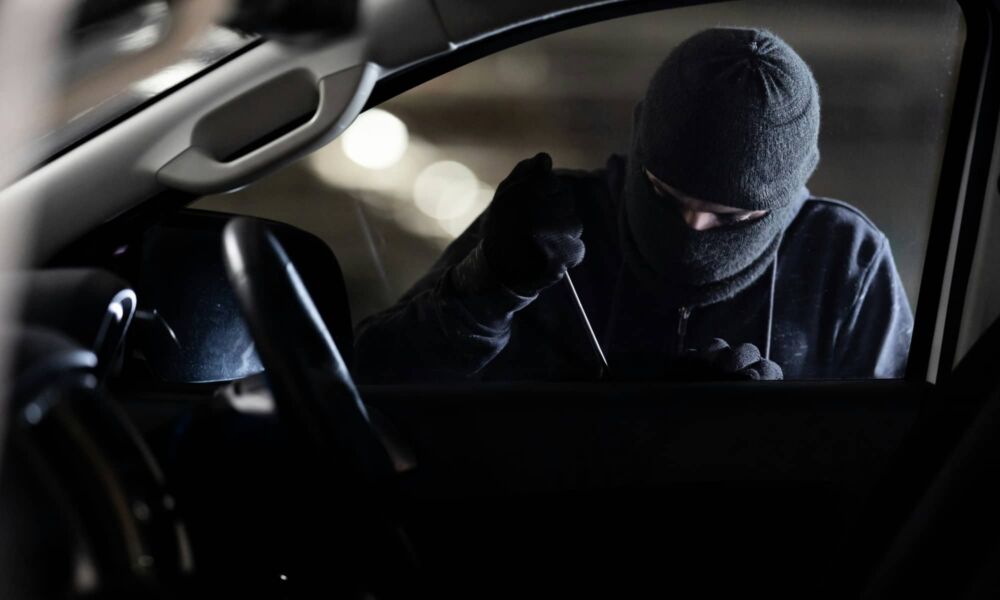 crime log masked man breaking into car