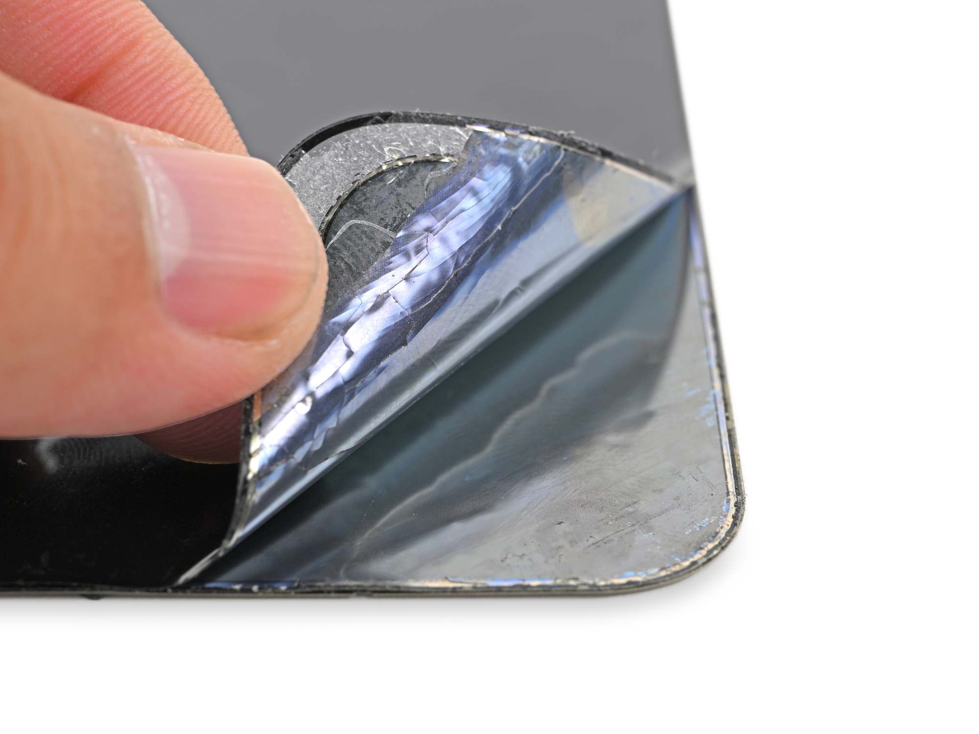 iPhone Duo nano-texture coating being peeled off on inner screen.